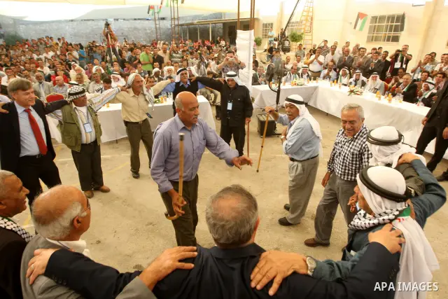 Palestinian Prime Minister, Salam Fayyad attends the opening of several centers in Hebron, in the West Bank of Hebron on June 24, 2012. Photo by Mahmoud Hrebat