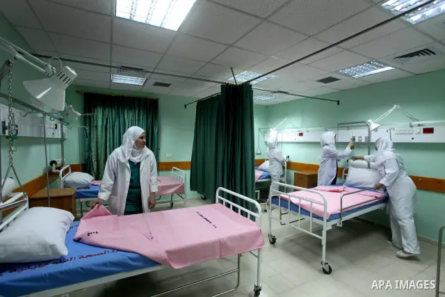 Palestinian doctors take part in the opening of the Al Harazin hospital generation in Gaza City on June, 25, 2012. Photo by Ashraf Amra.