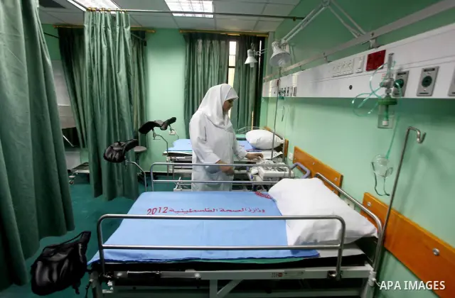 Palestinian doctors take part in the opening of the Al Harazin hospital generation in Gaza City on June, 25, 2012. Photo by Ashraf Amra.