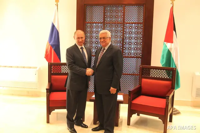Palestinian President Mahmoud Abbas meets with his Russian counterpart Vladimir Putin at his office in the West Bank city of Bethlehem on June 26, 2012./Pool/Luay Sababa