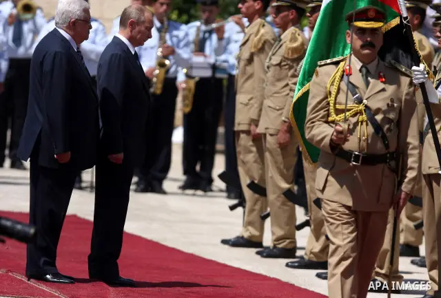 Palestinian President Mahmoud Abbas meets with his Russian counterpart Vladimir Putin at his office in the West Bank city of Bethlehem on June 26, 2012. photo by Issam Rimawi