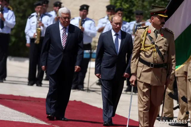 Palestinian President Mahmoud Abbas meets with his Russian counterpart Vladimir Putin at his office in the West Bank city of Bethlehem on June 26, 2012. photo by Issam Rimawi