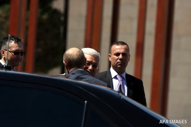 Palestinian President Mahmoud Abbas meets with his Russian counterpart Vladimir Putin at his office in the West Bank city of Bethlehem on June 26, 2012. photo by Issam Rimawi