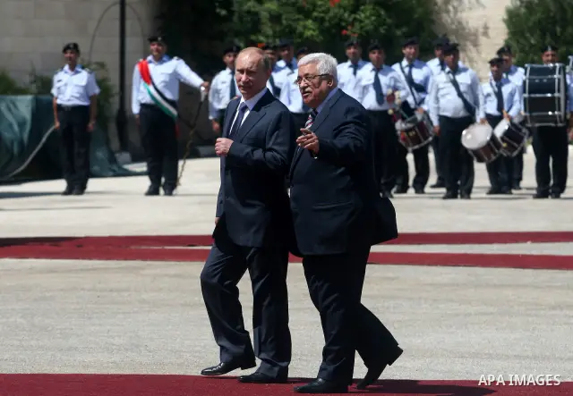 Palestinian President Mahmoud Abbas meets with his Russian counterpart Vladimir Putin at his office in the West Bank city of Bethlehem on June 26, 2012. photo by Issam Rimawi
