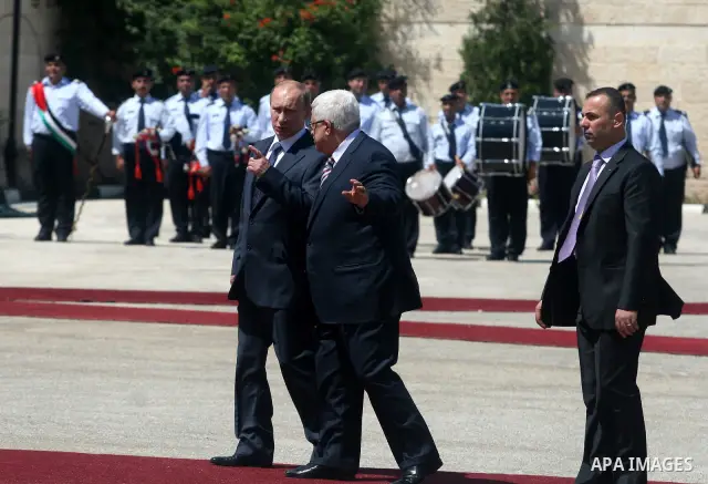 Palestinian President Mahmoud Abbas meets with his Russian counterpart Vladimir Putin at his office in the West Bank city of Bethlehem on June 26, 2012. photo by Issam Rimawi