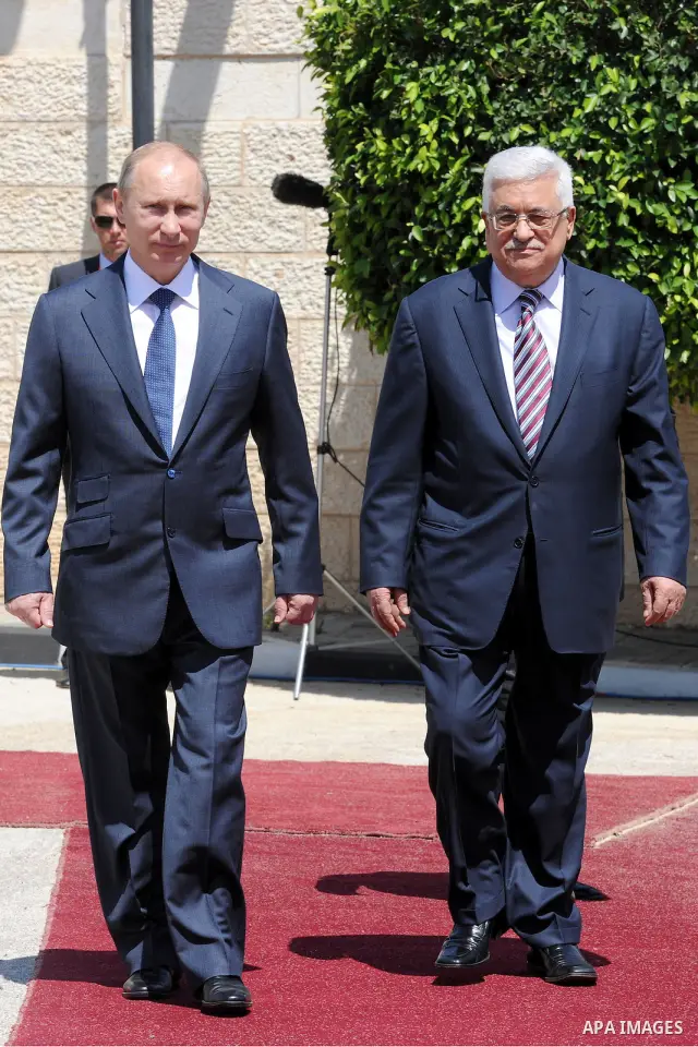 Palestinian President Mahmoud Abbas meets with his Russian counterpart Vladimir Putin at his office in the West Bank city of Bethlehem on June 26, 2012. Photo by Thaer Ganaim