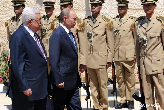 Palestinian President Mahmoud Abbas meets with his Russian counterpart Vladimir Putin at his office in the West Bank city of Bethlehem on June 26, 2012. Photo by Thaer Ganaim