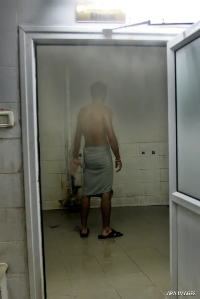 A Palestinian man takes a steam-bath at "Hamam al-Shefa", the traditional Turkish bath in the West Bank city of Nablus on June 28, 2012. The Turkish bath, built about 400 years ago during the Ottoman rule, opens 24 hours...