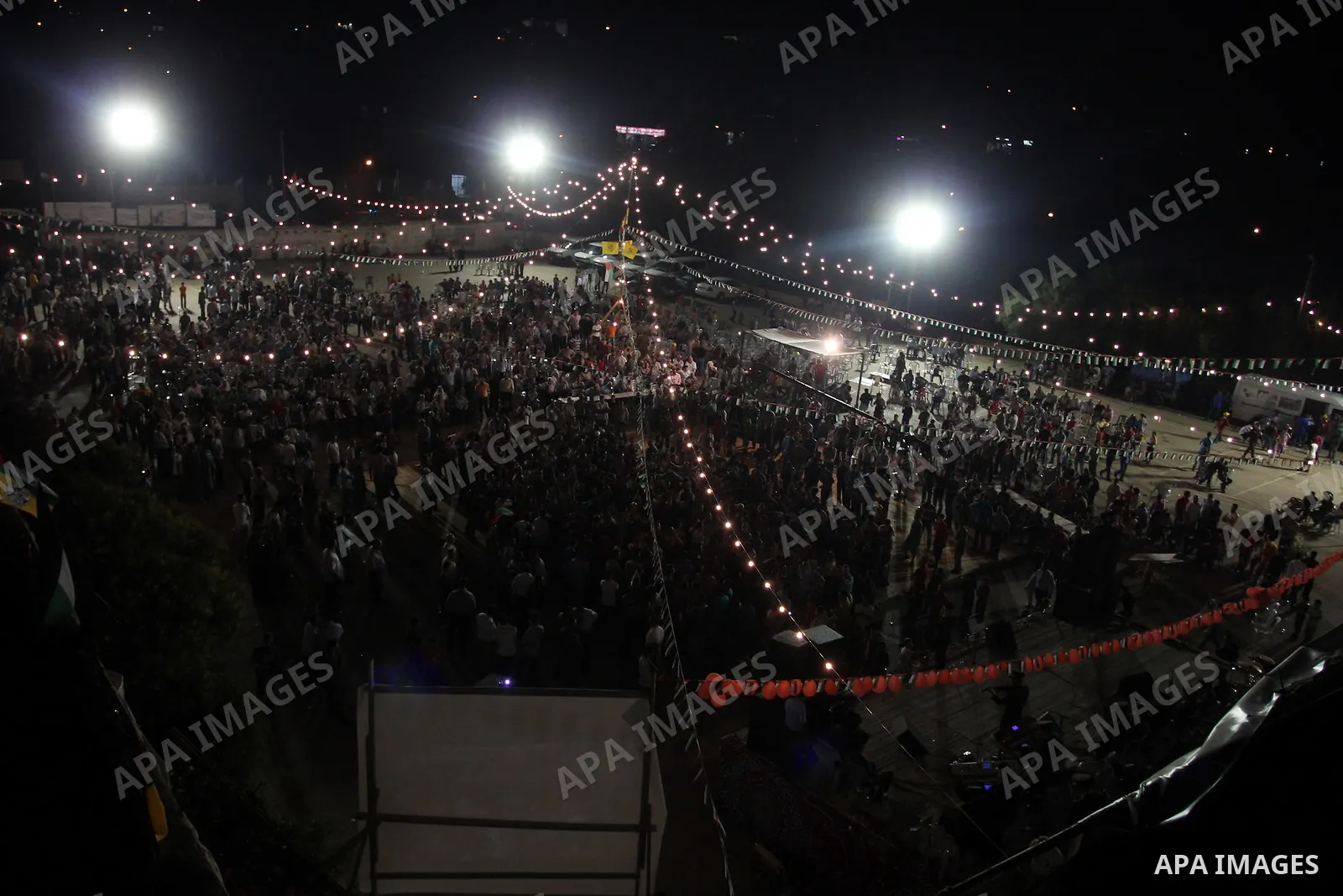 Palestinians celebrate during a mass wedding for 19 Groom, participation of Palestinian President Mahmoud Abbas (not seen) in the village of Silwad in the West Bank city of Ramallah, June 28, 2012. Photo by Issam Rimawi