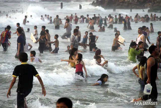 Palestinians enjoy swimming on their week-end in the Mediterranean sea in Gaza City on June 29, 2012. Photo by Majdi Fathi