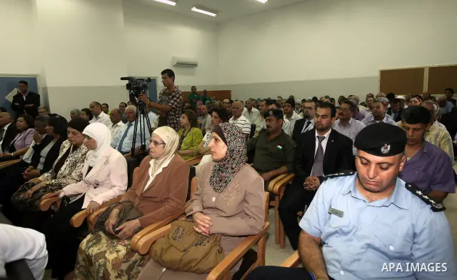 Palestinian Prime Minister Salam Fayyad (not seen) speaks during the opening of the care for the elderly Center "House of Grandparents", in the West Bank city of Jerico, on 04 July 2012. Photo by Mustafa Abu dayeh