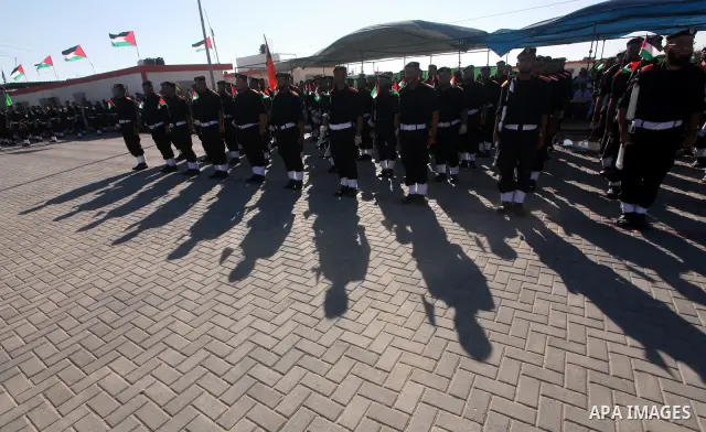 Graduating Hamas's police officers stand to attention during a ceremony in Gaza City on July 05, 2012. Hamas has governed the Gaza Strip since June 2007, after it won a majority of seats in the Palestinian Parliament in...