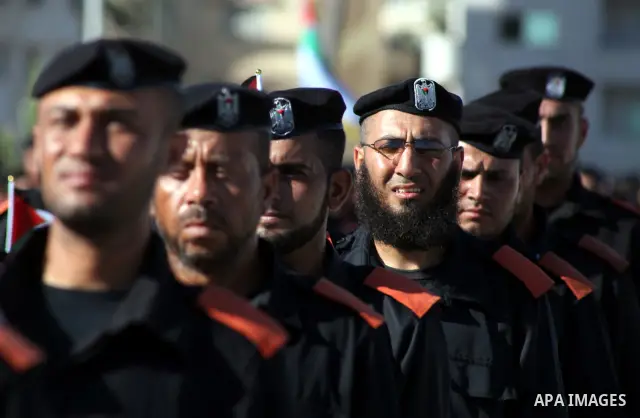 Graduating Hamas's police officers stand to attention during a ceremony in Gaza City on July 05, 2012. Hamas has governed the Gaza Strip since June 2007, after it won a majority of seats in the Palestinian Parliament in...