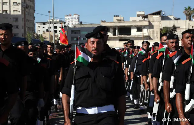 Graduating Hamas's police officers stand to attention during a ceremony in Gaza City on July 05, 2012. Hamas has governed the Gaza Strip since June 2007, after it won a majority of seats in the Palestinian Parliament in...