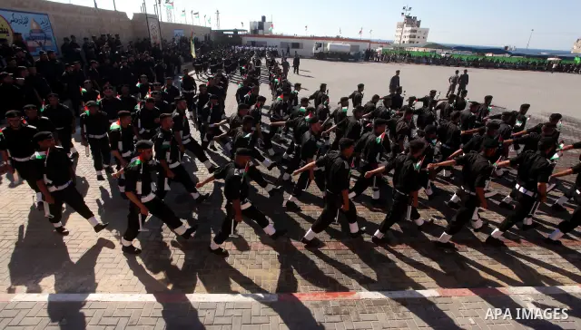 Graduating Hamas's police officers march during a ceremony in Gaza City on July 05, 2012. Hamas has governed the Gaza Strip since June 2007, after it won a majority of seats in the Palestinian Parliament in the January 2...