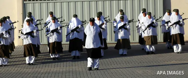 Female Hamas's police officers stand to attention during a ceremony in Gaza City on July 05, 2012. Hamas has governed the Gaza Strip since June 2007, after it won a majority of seats in the Palestinian Parliament in the...