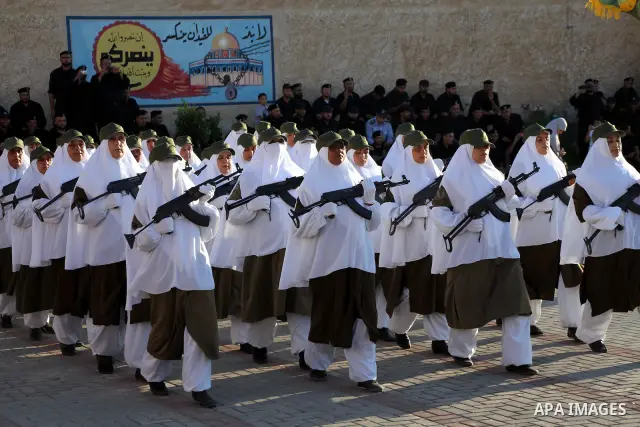 Female Hamas's police officers march during a ceremony in Gaza City on July 05, 2012. Hamas has governed the Gaza Strip since June 2007, after it won a majority of seats in the Palestinian Parliament in the January 2006...