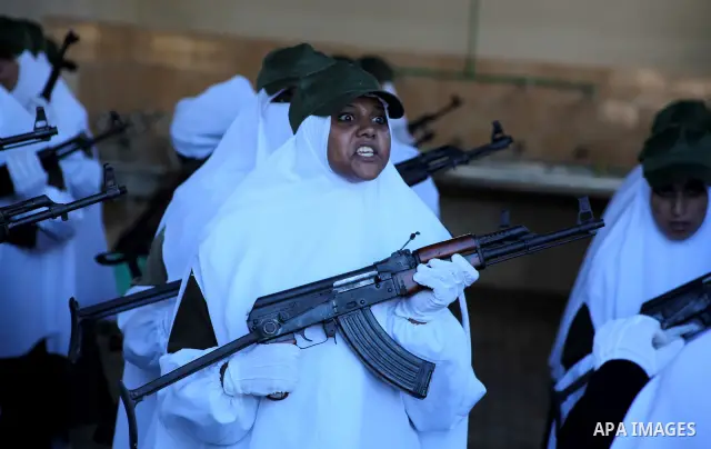 Female Hamas's police officers stand to attention during a ceremony in Gaza City on July 05, 2012. Hamas has governed the Gaza Strip since June 2007, after it won a majority of seats in the Palestinian Parliament in the...