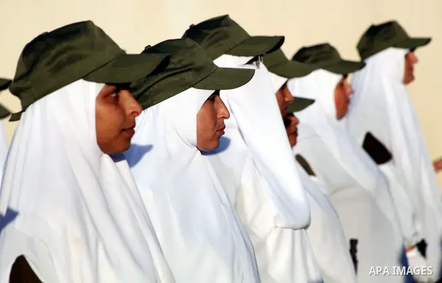 Female Hamas's police officers stand to attention during a ceremony in Gaza City on July 05, 2012. Hamas has governed the Gaza Strip since June 2007, after it won a majority of seats in the Palestinian Parliament in the...