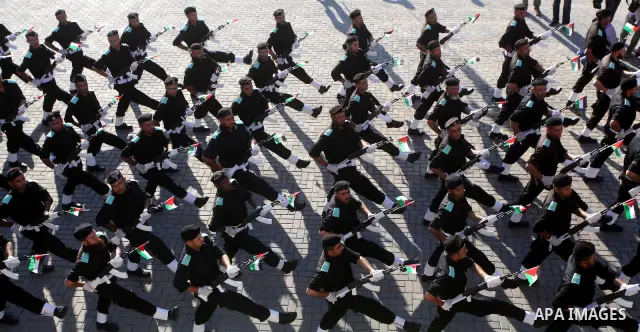 Graduating Hamas's police officers march during a ceremony in Gaza City on July 05, 2012. Hamas has governed the Gaza Strip since June 2007, after it won a majority of seats in the Palestinian Parliament in the January 2...