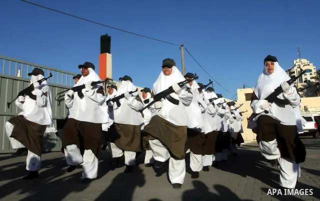 Female Hamas's police officers march during a ceremony in Gaza City on July 05, 2012. Hamas has governed the Gaza Strip since June 2007, after it won a majority of seats in the Palestinian Parliament in the January 2006...