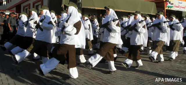 Female Hamas's police officers march during a ceremony in Gaza City on July 05, 2012. Hamas has governed the Gaza Strip since June 2007, after it won a majority of seats in the Palestinian Parliament in the January 2006...
