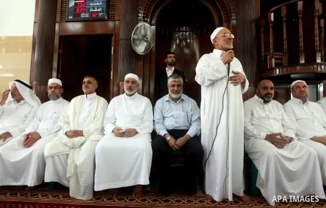 Palestinian Prime Minister in Gaza Ismail Haniyeh attends Friday prayer in Deir al-Balah in the center of Gaza Strip on 06 July 2012. A Palestinian official said Thursday, July 5, 2012 that Gaza's prime minister will hea...