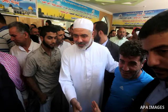 Palestinian Prime Minister in Gaza Ismail Haniyeh greets Palestinians following Friday prayer in Deir al-Balah in the center of Gaza Strip on 06 July 2012. A Palestinian official said Thursday, July 5, 2012 that Gaza's p...