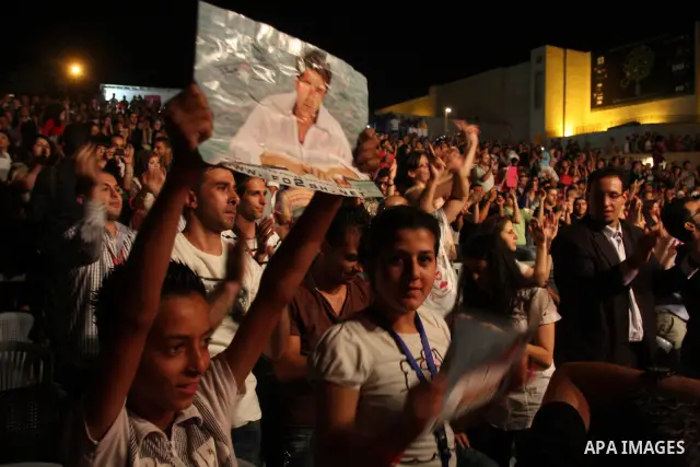 Egyptian singer Mohamed Fouad during a concert at the Palestine International Festival for singing and music in the West Bank city of Ramallah, on July 7, 2012. Photo by Issam Rimawi