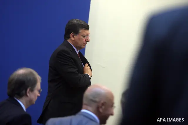 European Commission President Jose Manuel Barroso attends during a joint press conference with Palestinian prime minister Salam Fayyad (unseen) in the West Bank city of Ramallah on July 8, 2012, as part of his first trip...