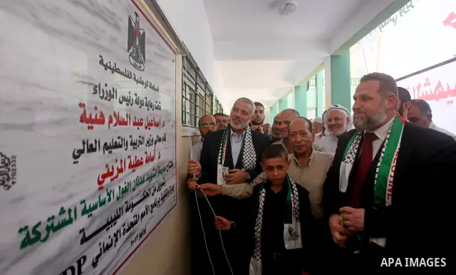 Palestinian Prime Minister in Gaza Ismail Haniyeh attends the opening of a new school in Zaytoon neighborhood Gaza city on 08 July 2012. A Palestinian official says Gaza's prime minister will head to Cairo within the nex...