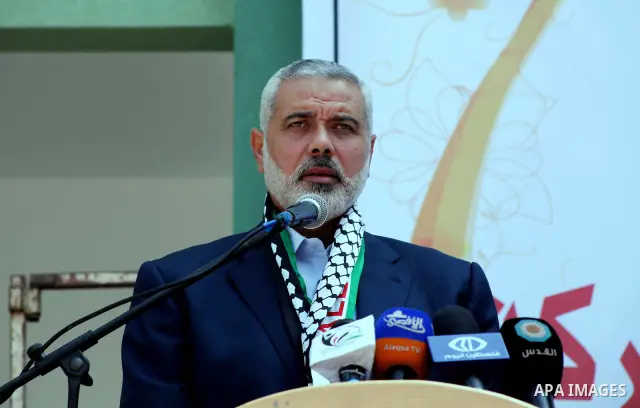 Palestinian Prime Minister in Gaza Ismail Haniyeh speaks during the opening of a new school in Zaytoon neighborhood Gaza city on 08 July 2012. A Palestinian official says Gaza's prime minister will head to Cairo within t...