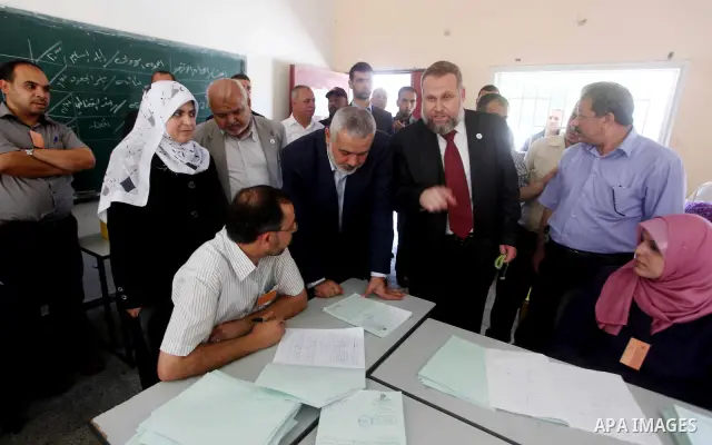 Palestinian Prime Minister in Gaza Ismail Haniyeh attends the opening of a new school in Zaytoon neighborhood Gaza city on 08 July 2012. A Palestinian official says Gaza's prime minister will head to Cairo within the nex...