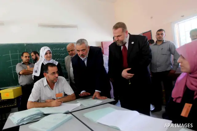 Palestinian Prime Minister in Gaza Ismail Haniyeh attends the opening of a new school in Zaytoon neighborhood Gaza city on 08 July 2012. A Palestinian official says Gaza's prime minister will head to Cairo within the nex...