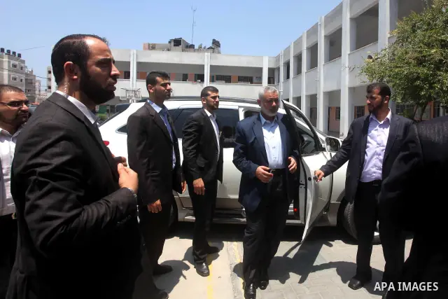 Palestinian Prime Minister in Gaza Ismail Haniyeh attends the opening of a new school in Zaytoon neighborhood Gaza city on 08 July 2012. A Palestinian official says Gaza's prime minister will head to Cairo within the nex...