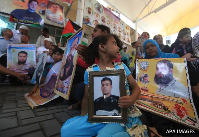 Palestinians gather during a protest in front of the Red Cross' offices in Gaza city calling of release of palestinian prisoners on July, 09, 2012. Photo by Majdi Fathi