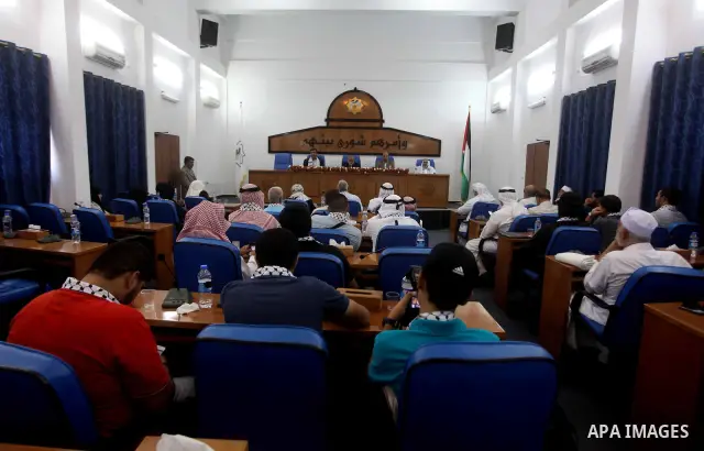 Ahmad Bahar a Hamas leader receives members of "Miles of Smiles 14" aid convoy in Legislative Council in Gaza city on 09 July 2012. Photo by Ashraf Amra