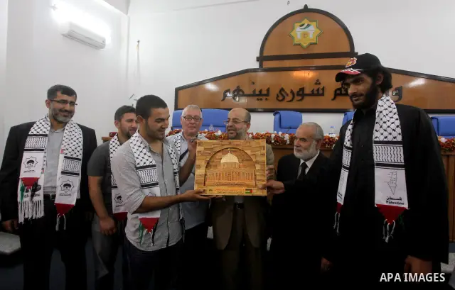 Ahmad Bahar a Hamas leader receives members of "Miles of Smiles 14" aid convoy in Legislative Council in Gaza city on 09 July 2012. Photo by Ashraf Amra