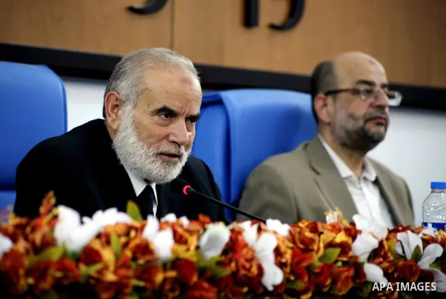 Ahmad Bahar a Hamas leader receives members of "Miles of Smiles 14" aid convoy in Legislative Council in Gaza city on 09 July 2012. Photo by Ashraf Amra