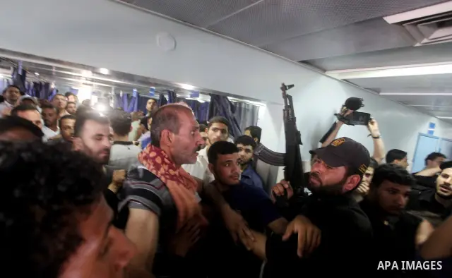 Palestinian soccer player Mahmoud Al-Sarsak arrives to al-Shefa hospital in Gaza City July 10, 2012. Israel released the Gaza soccer player on Tuesday in a deal to end his intermittent four-month hunger strike after he s...