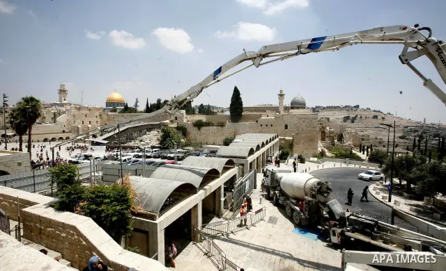 Workers of Israel are seen at an excavation site of an ancient places near al-Aqsa Mosque and Western Wall in order to judaize the area, in Jerusalem's old city, on 10 July 2012. Photo by Mahfouz Abu Turk