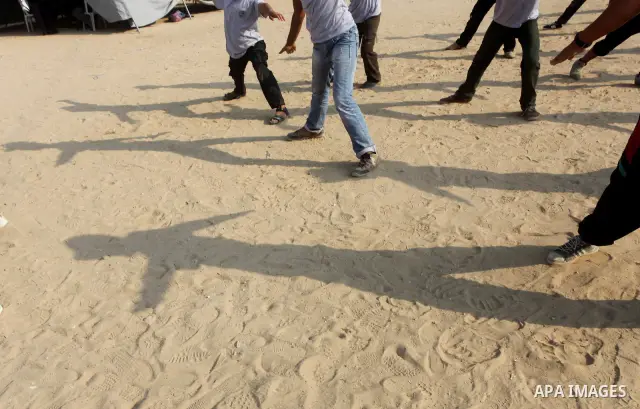 Palestinian children take part in a summer camp organized by Hamas movement at Shati refugee camp in Gaza City July 10, 2012. Hamas movement organized dozens of summer camps for Palestinian children during the period of...