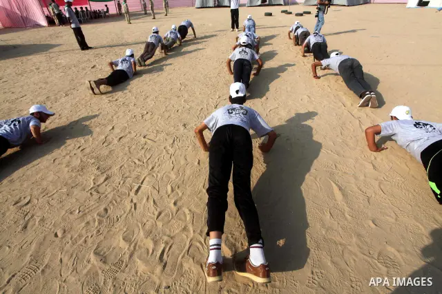 Palestinian children take part in a summer camp organized by Hamas movement at Shati refugee camp in Gaza City July 10, 2012. Hamas movement organized dozens of summer camps for Palestinian children during the period of...