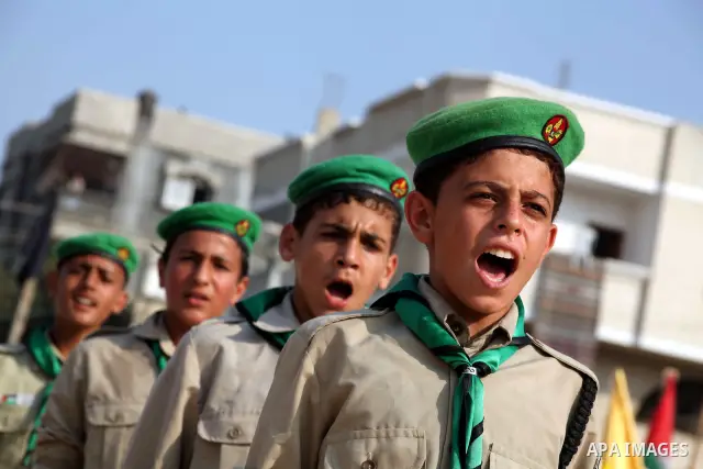 Palestinian children take part in a summer camp organized by Hamas movement at Shati refugee camp in Gaza City July 10, 2012. Hamas movement organized dozens of summer camps for Palestinian children during the period of...