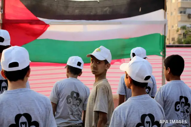 Palestinian children take part in a summer camp organized by Hamas movement at Shati refugee camp in Gaza City July 10, 2012. Hamas movement organized dozens of summer camps for Palestinian children during the period of...