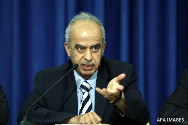 The chairman of the medical commission of Palestinian inquiry commission into the death of late Palestinian leader Yasser Arafat, Abdullah al-Basheer holds a press conference with other Palestinian officials in West Bank...