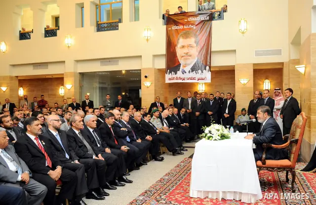Egyptian President Mohamed Morsi meeting with the Egyptian community in Saudi Arabia at the Egyptian consulate in Jeddah, Saudi Arabia, 12 July 2012. Egyptian President Morsi arrived 11 July in Saudi Arabia on his first...