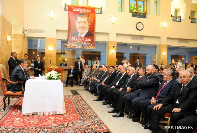 Egyptian President Mohamed Morsi meeting with the Egyptian community in Saudi Arabia at the Egyptian consulate in Jeddah, Saudi Arabia, 12 July 2012. Egyptian President Morsi arrived 11 July in Saudi Arabia on his first...