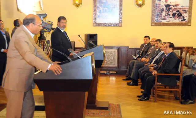 Egyptian President Mohamed Morsi (R) and his Tunisian counterpart Moncef Marzouki (L) attend a joint press conference at the Presidential Palace in Cairo on July 13, 2012. The post-uprising presidents of Egypt and Tunisi...