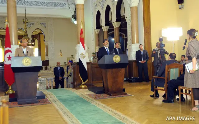 Egyptian President Mohamed Morsi (R) and his Tunisian counterpart Moncef Marzouki (L) attend a joint press conference at the Presidential Palace in Cairo on July 13, 2012. The post-uprising presidents of Egypt and Tunisi...